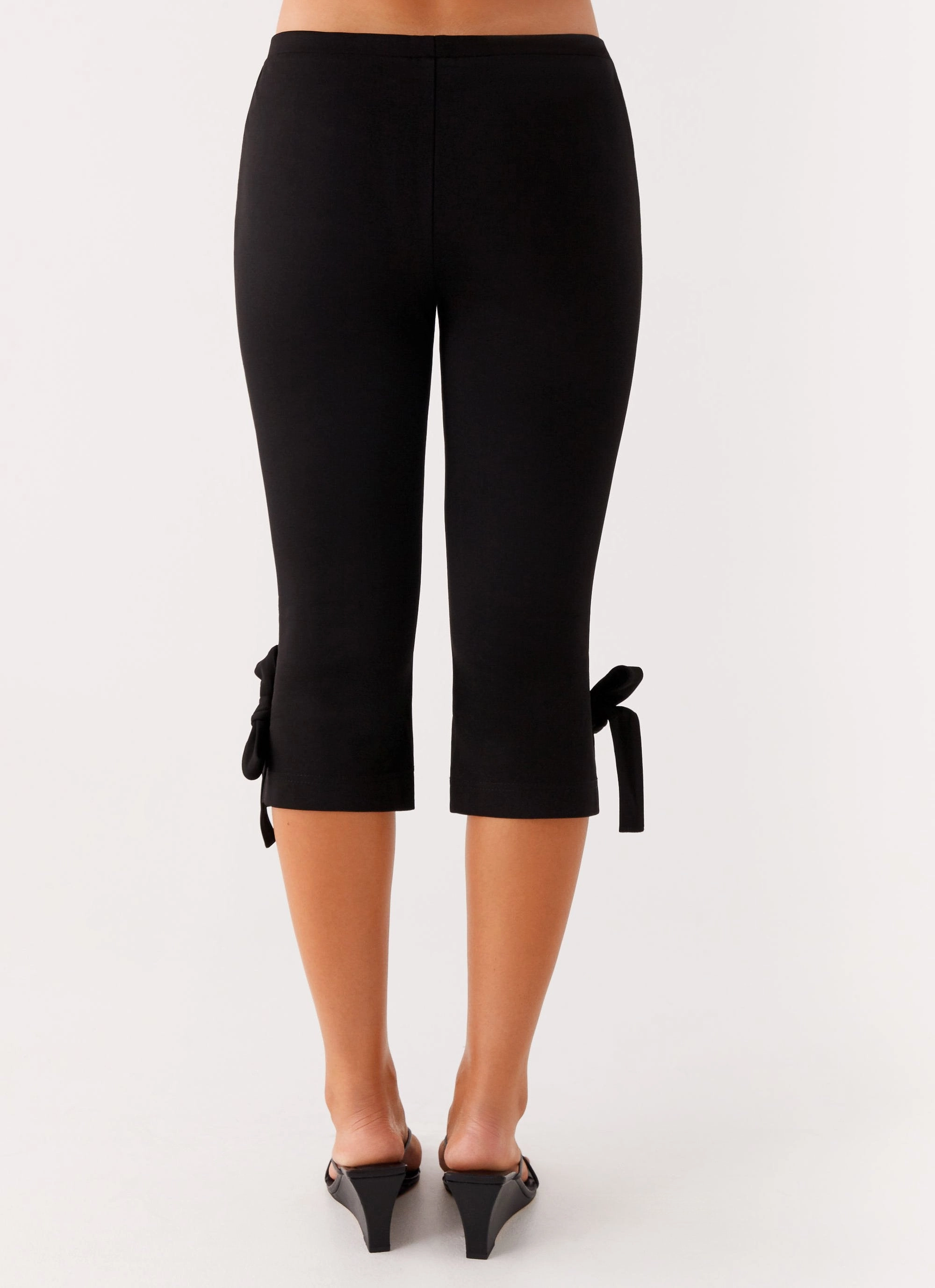 Stylish Cut Takeover Capri Pants - Black