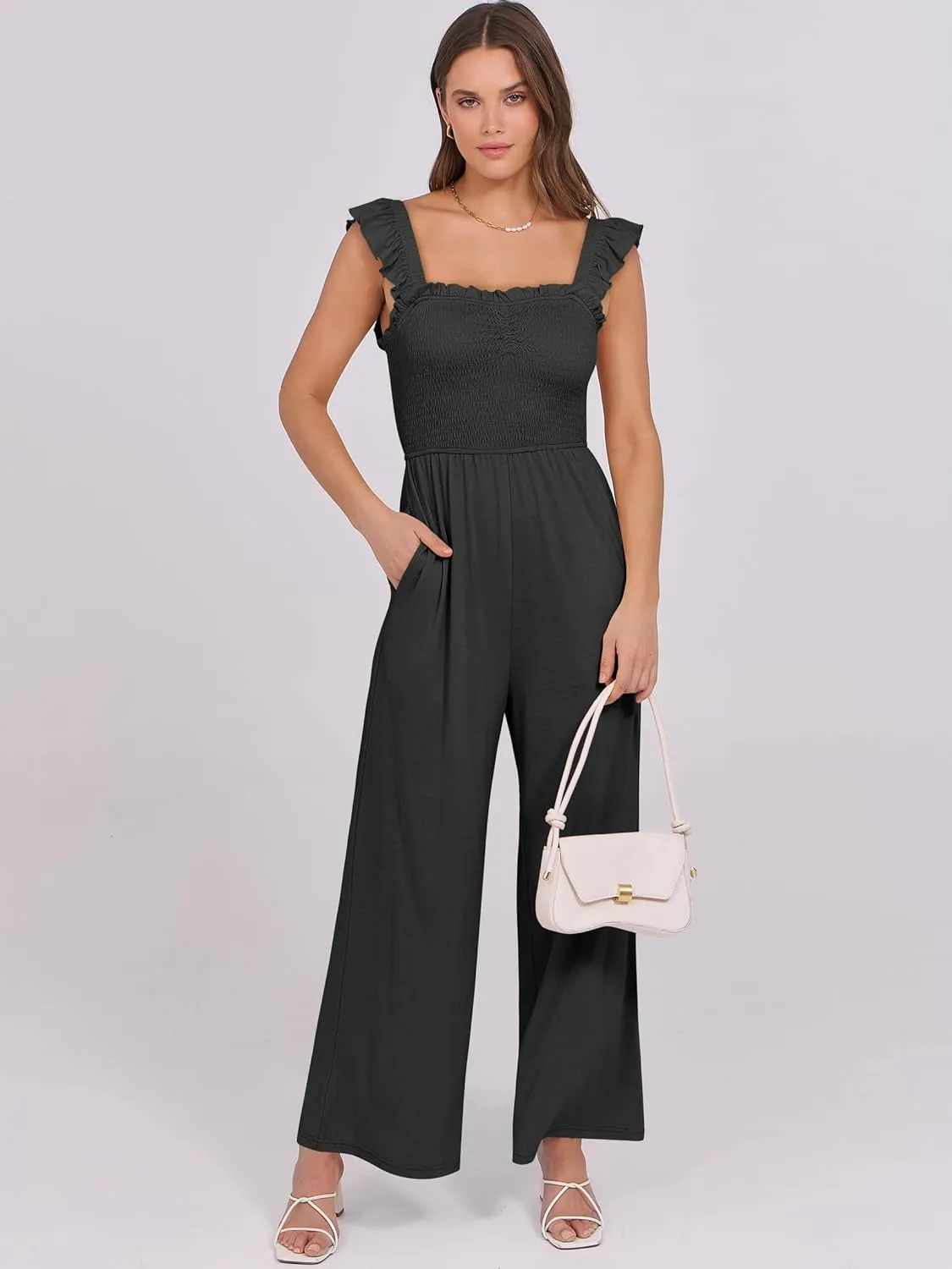 Caracilia Womens Jumpsuit Sleeveless Casual Dressy Smocked Wide Leg Rompers Summer Vacation Jumpers with Pockets 2025 Outfits