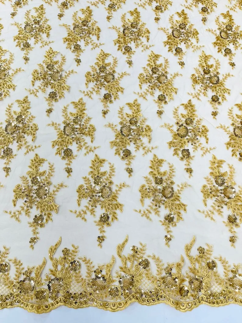 Gorgeous gold French design embroider and beaded on a mesh lace. Wedding/Bridal/Prom/Nightgown fabric-dresses-apparel-fashion-sold by yard.