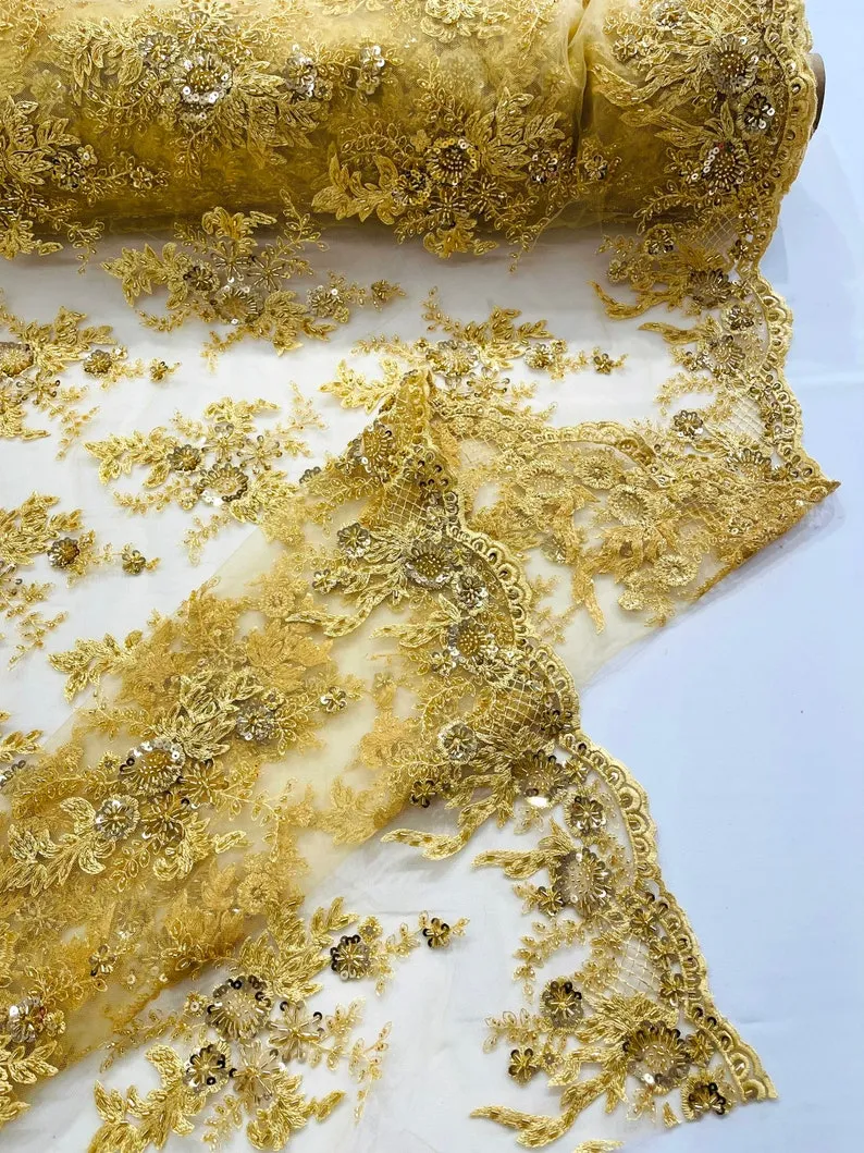 Gorgeous gold French design embroider and beaded on a mesh lace. Wedding/Bridal/Prom/Nightgown fabric-dresses-apparel-fashion-sold by yard.