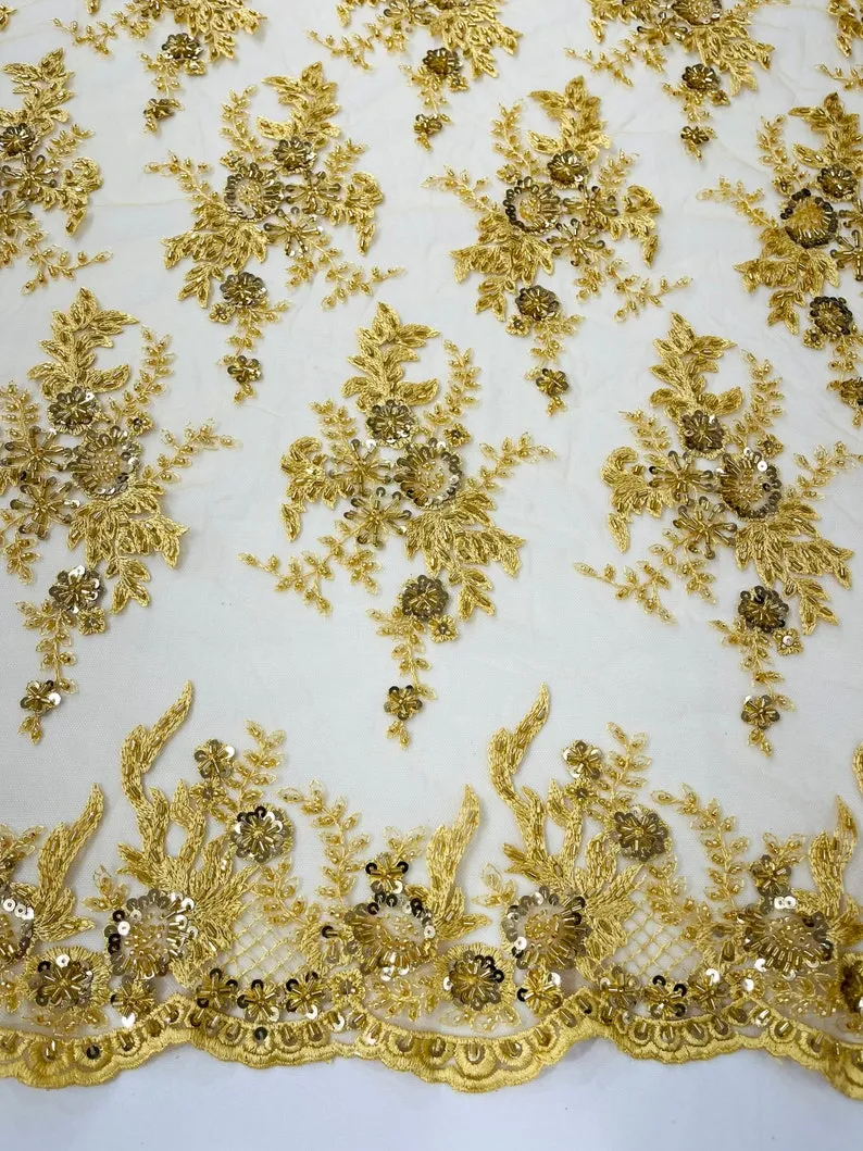 Gorgeous gold French design embroider and beaded on a mesh lace. Wedding/Bridal/Prom/Nightgown fabric-dresses-apparel-fashion-sold by yard.