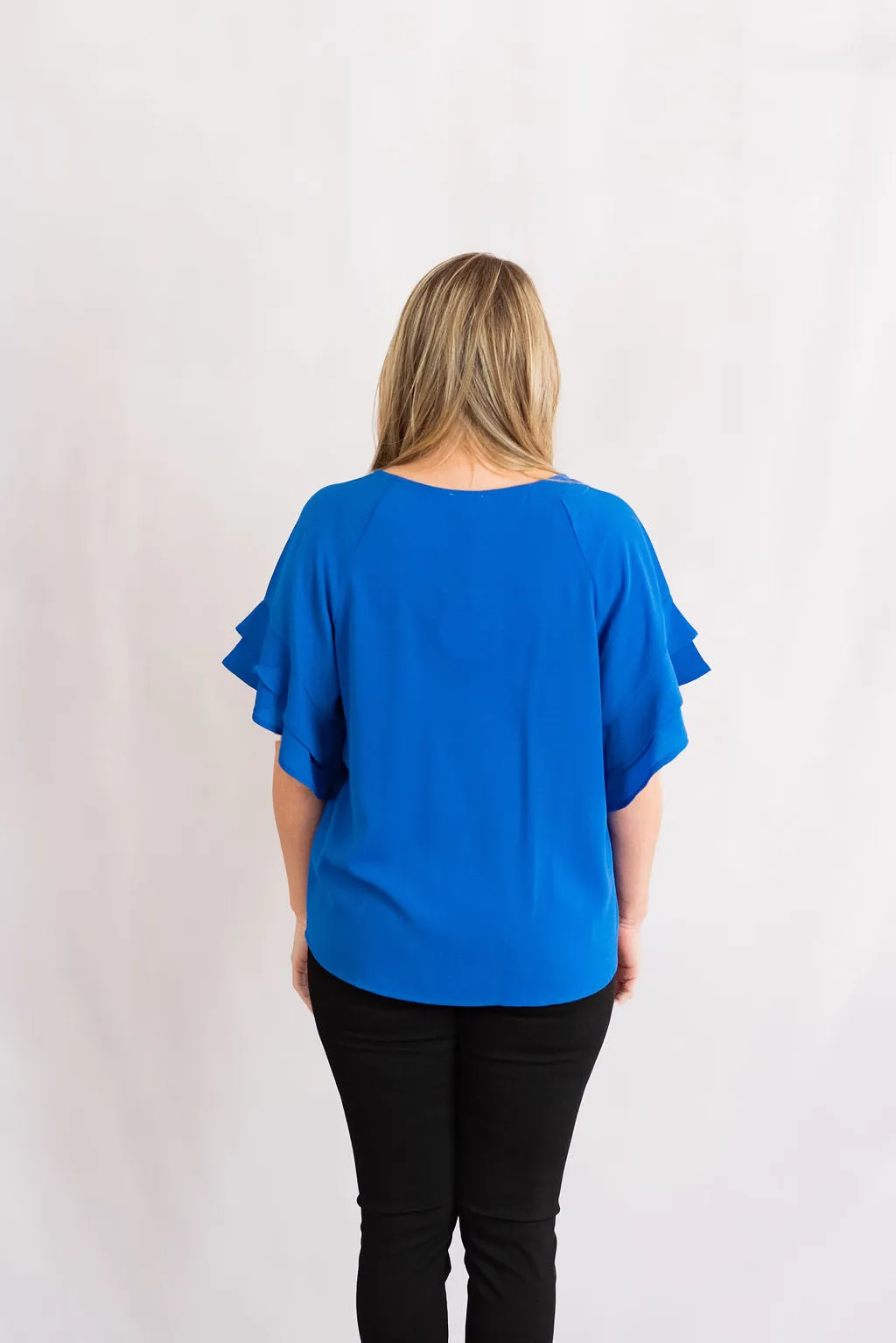 Layered Ruffle Sleeve Blouse by Umgee Clothing