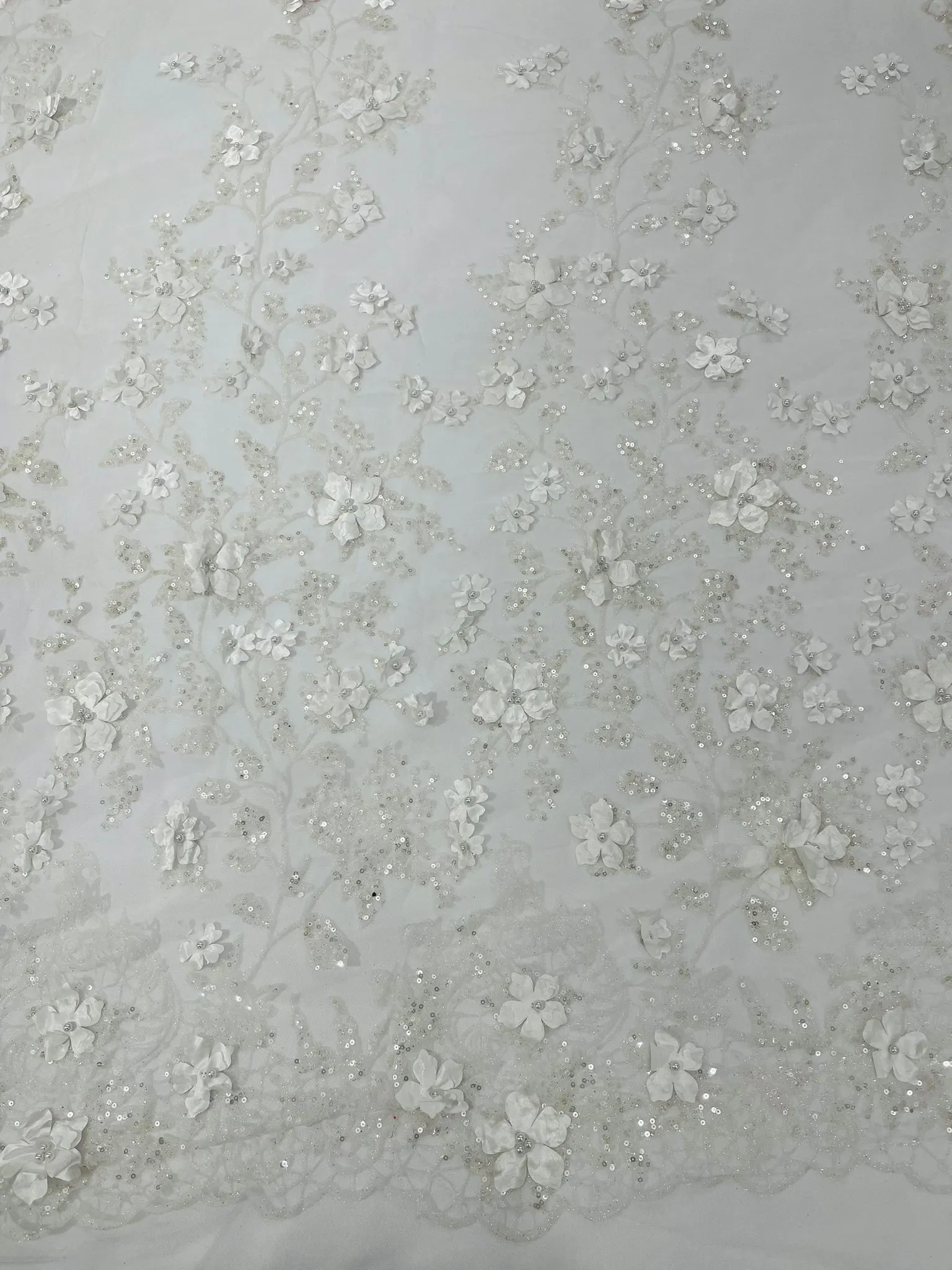 Princess Glitter 3d floral design embroidery with pearls in a mesh lace-sold by the yard.