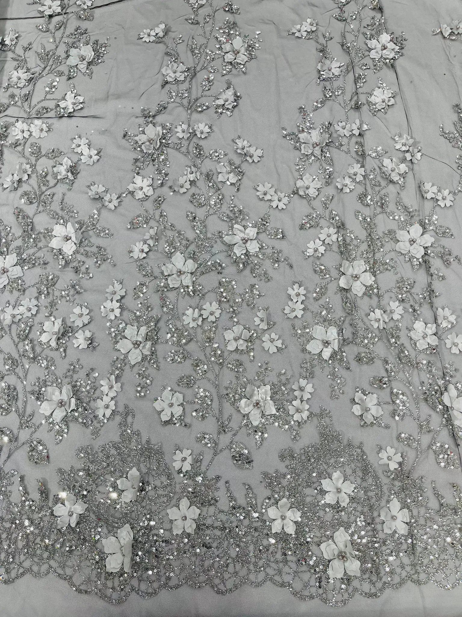 Princess Glitter 3d floral design embroidery with pearls in a mesh lace-sold by the yard.