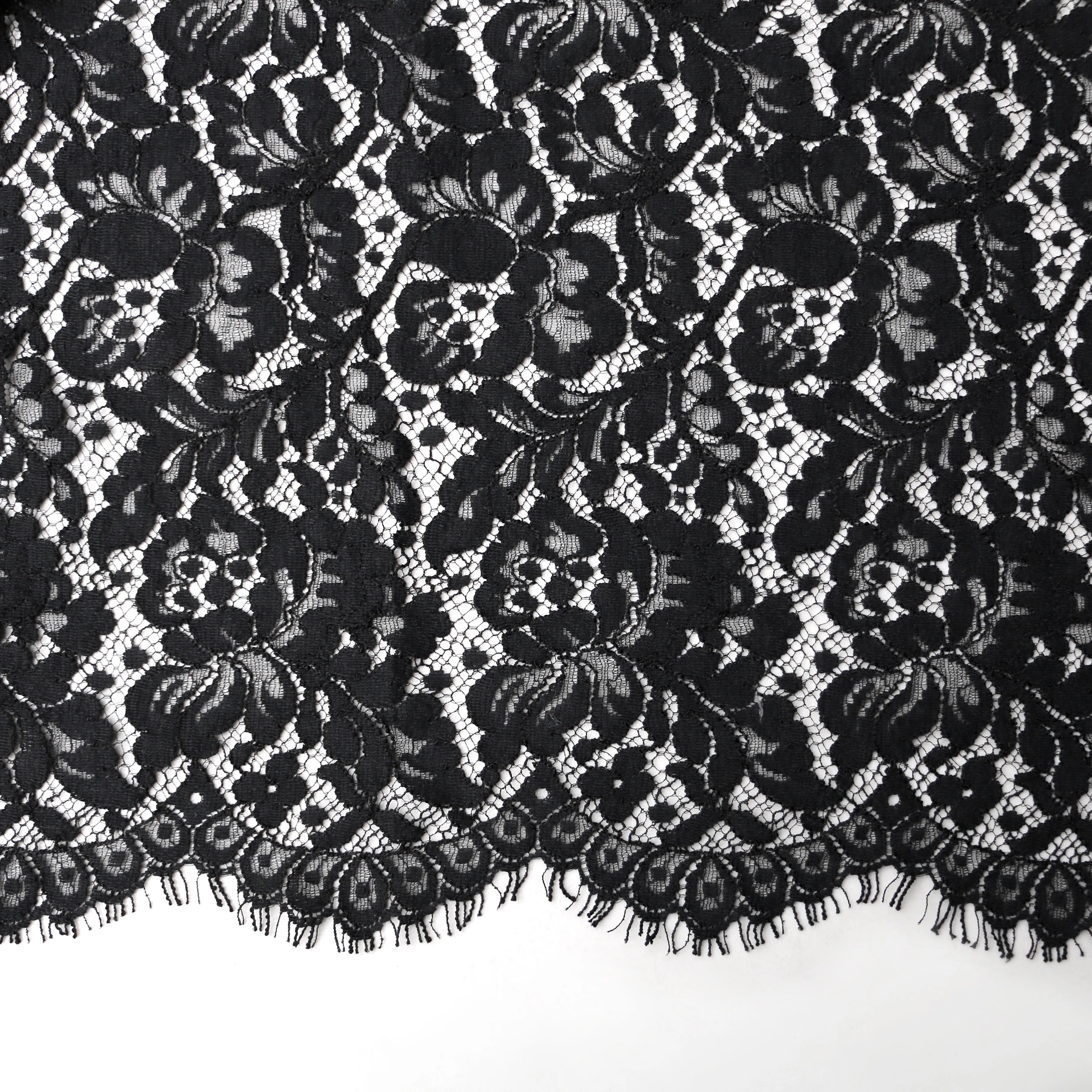Remnant of Cut Out Black Lace