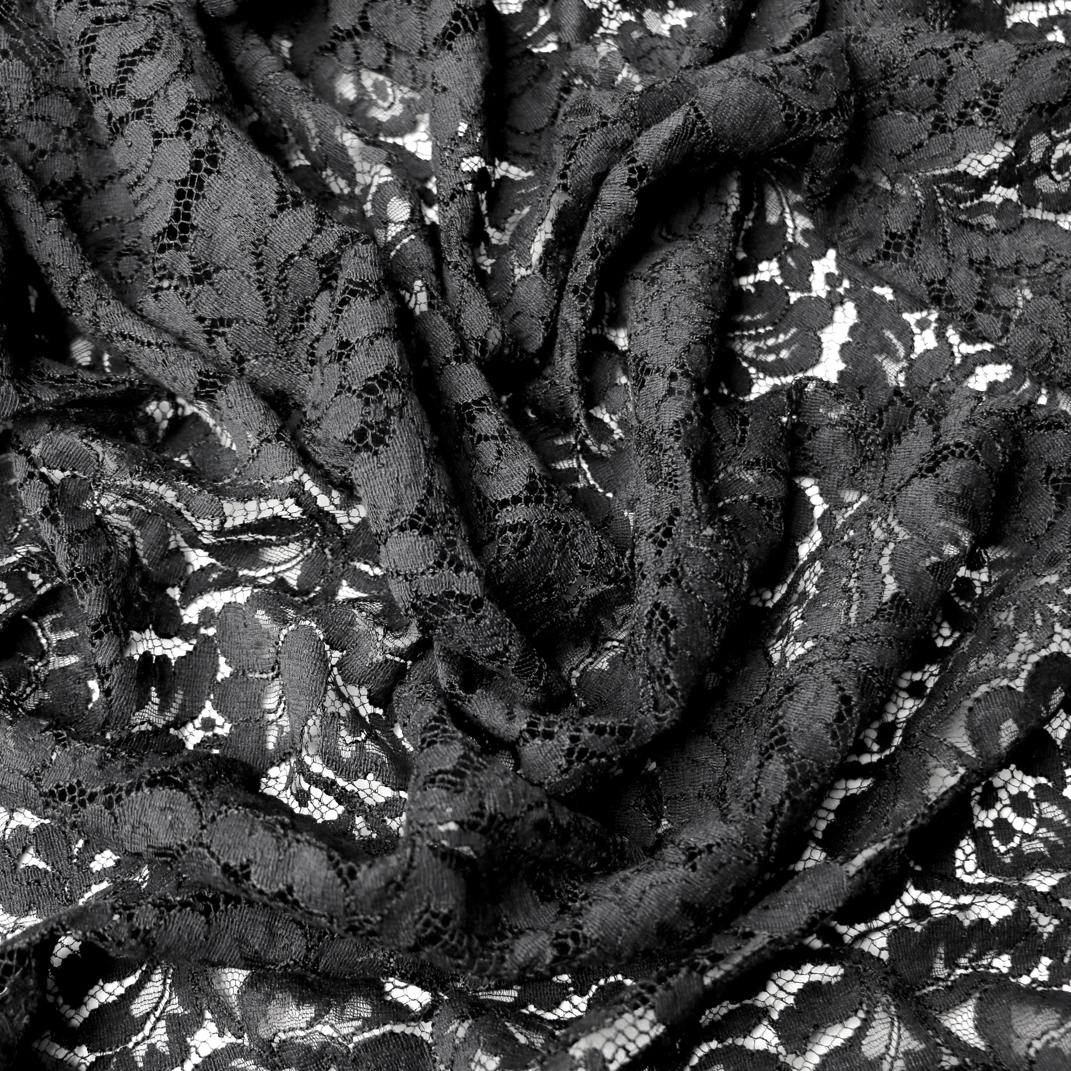 Remnant of Cut Out Black Lace