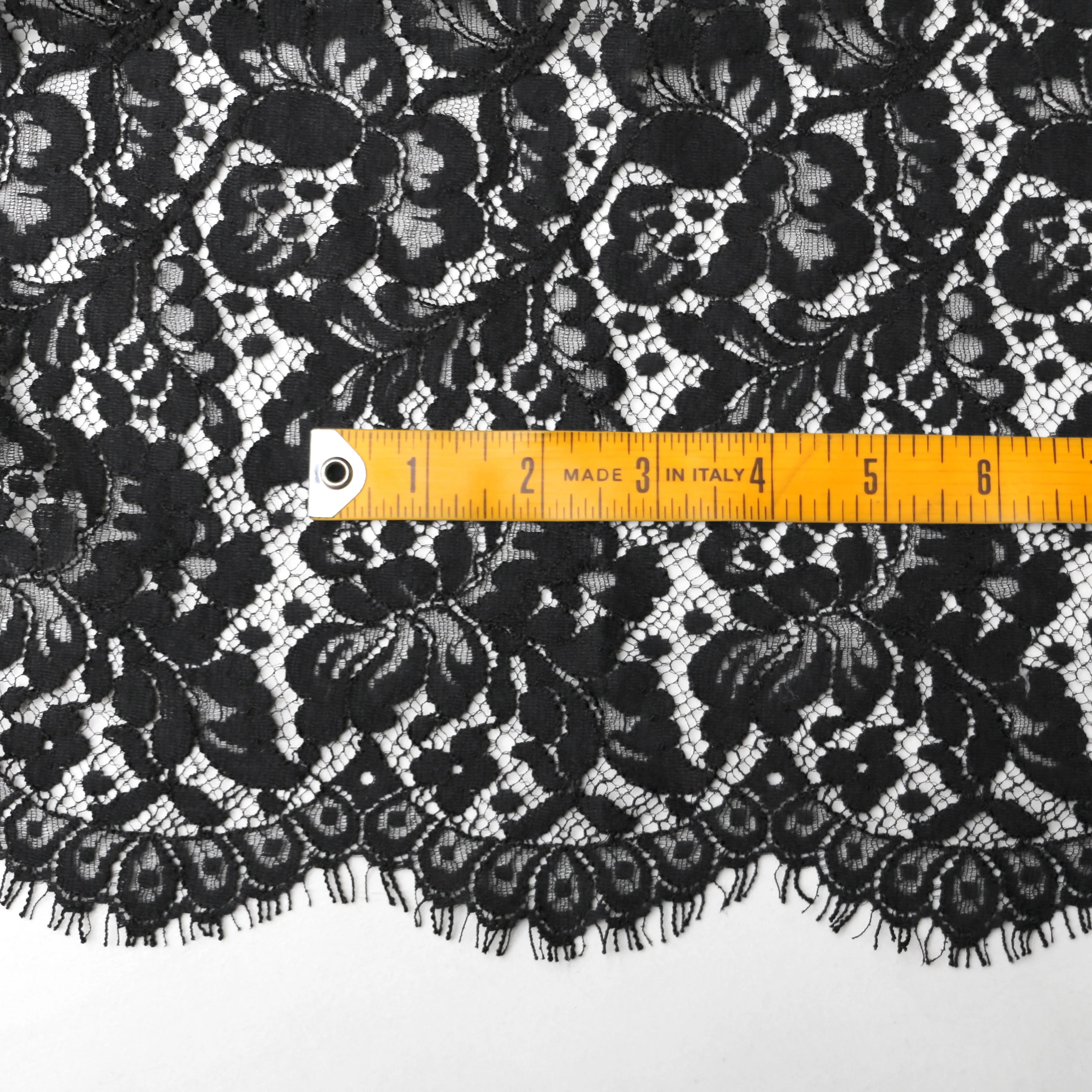 Remnant of Cut Out Black Lace