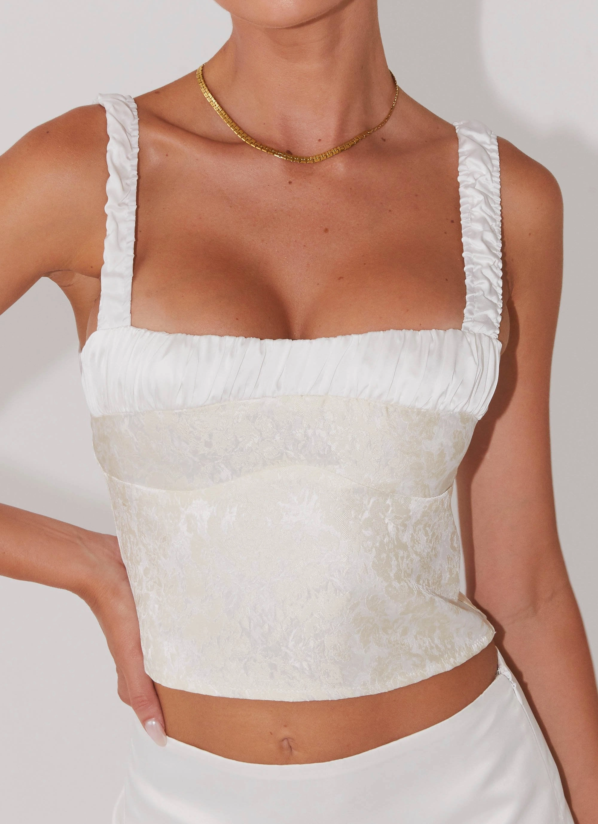 Ryder Bustier Top - Ivory Sky Ribbed Hem Hydrophobic Surface Treatment