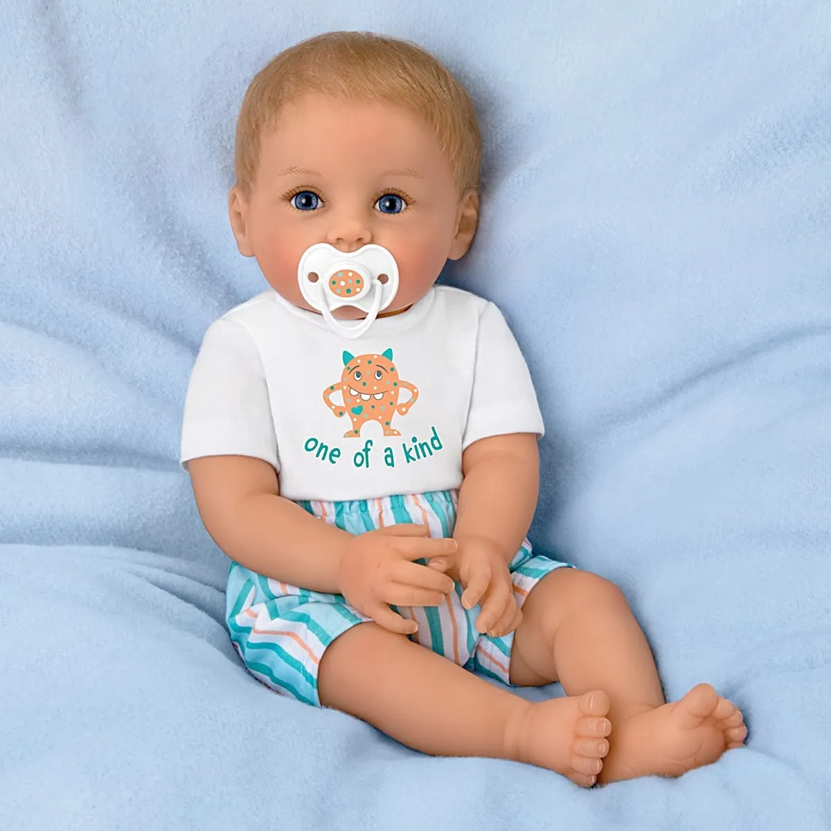 The Ashton - Drake Galleries Cody One of a Kind Lifelike So Truly Real® Baby Boy Doll Magnetic Pacifier Weighted Fully Poseable with Soft RealTouch® Vinyl Skin by Doll Artist Ping Lau  18"-Inches
