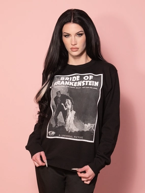 Universal Monsters: Bride of Frankenstein Vintage Movie Advertisement Sweatshirt in Black (unisex) All Day Flex Universal Monsters: Bride of Frankenstein Vintage Movie Advertisement Sweatshirt in Black (unisex) Outdoor Activity Movie Night