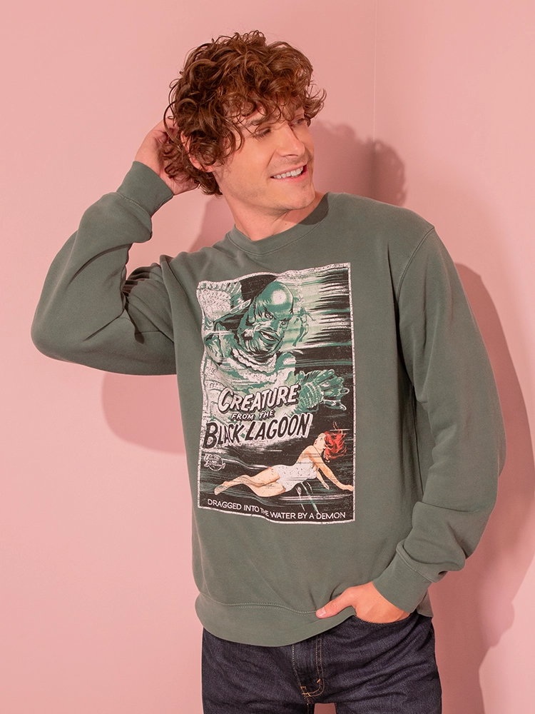 Comfortable Shape Universal Monsters: Creature from the Black Lagoon Movie Poster Sweatshirt in Vintage Green (unisex)