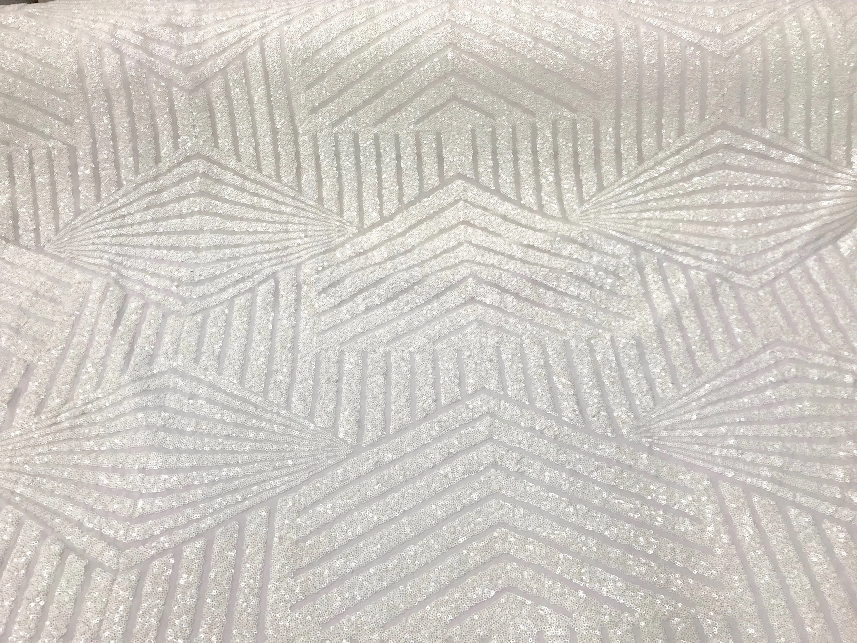 White sequins geometric design embroider on a white 4 way stretch power mesh-dresses-fashion-prom-nightgown-apparel-sold by the yard.